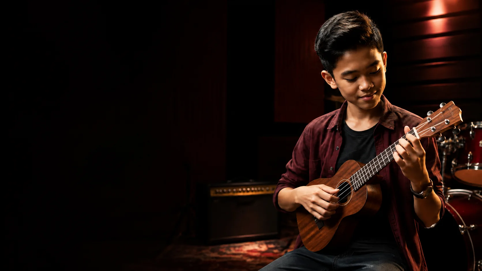 Person holding a ukulele.
