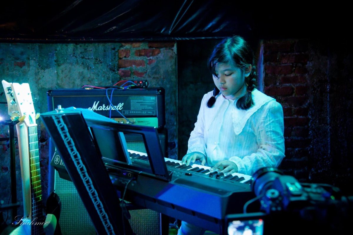 AOR student performing Piano on stage